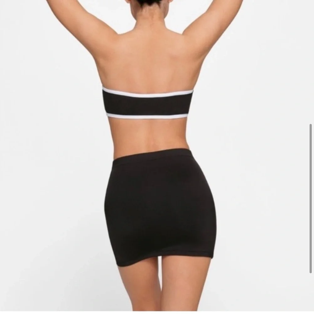 SKIMS sporty zipper swim mini skirt black p1.